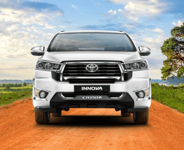 White Toyota Innova Crysta front view